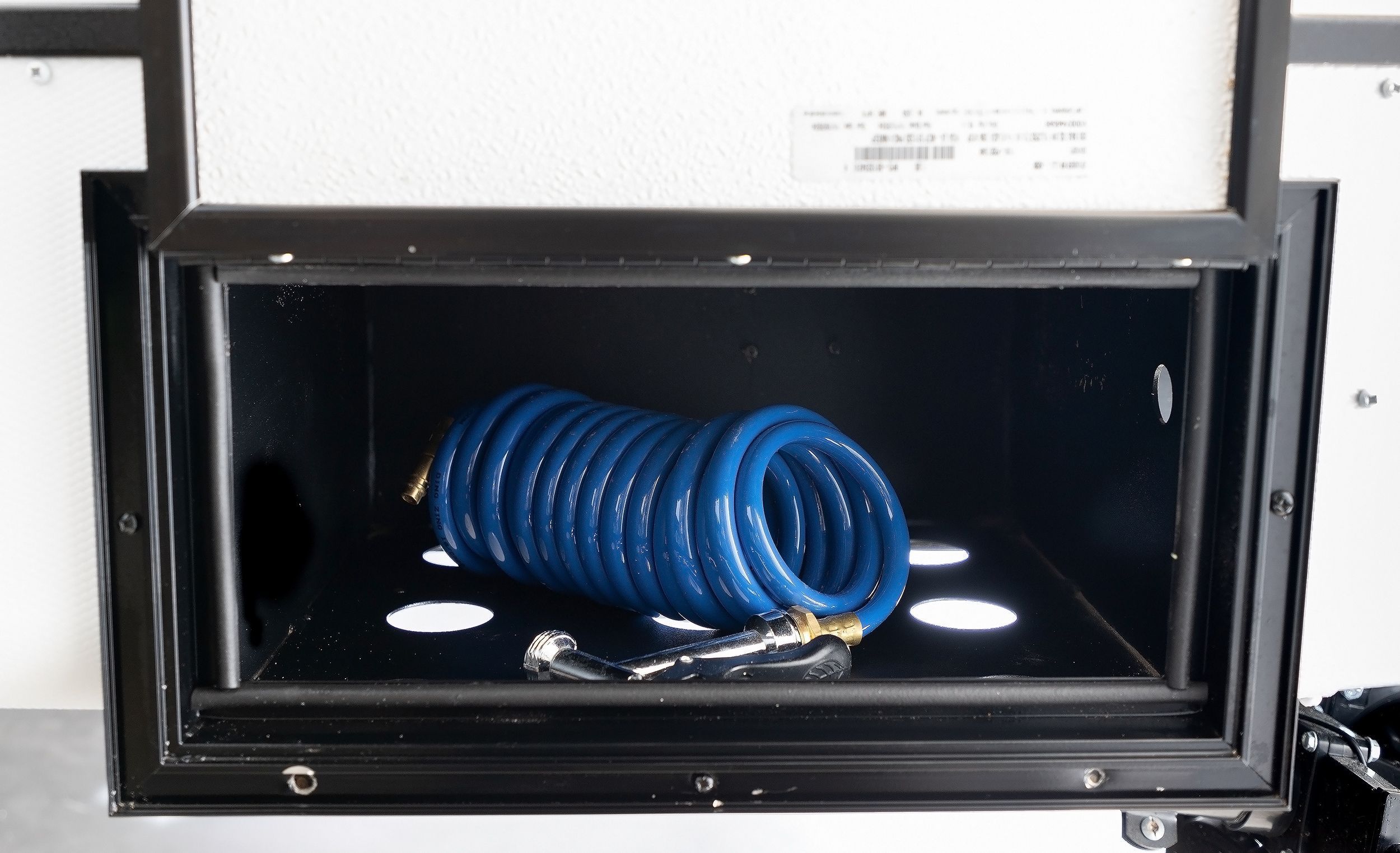 Glove/Hose Box near the Tank Valves